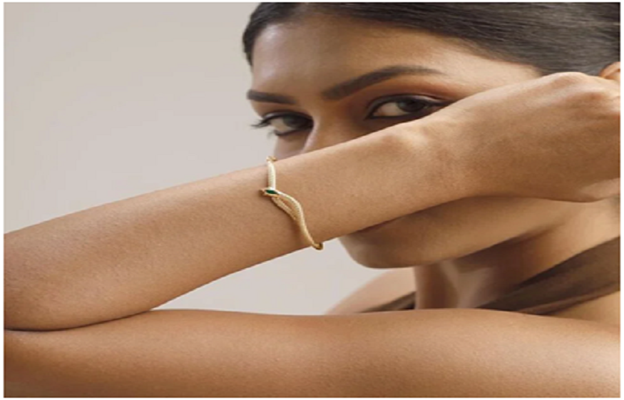 Coiled in Elegance Gold Bangle